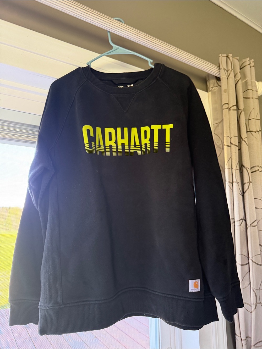 Carhartt women’s  Black Crewneck Sweatshirt with Yellow Logo